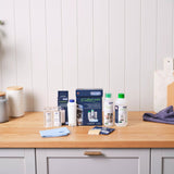 De'Longhi Coffee Care Kit contents on a kitchen bench