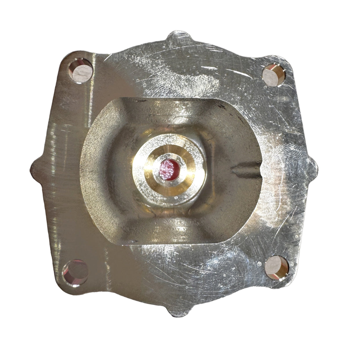 Underside of the Gaggia Classic brass boiler showing the machined sealing face and four mounting holes